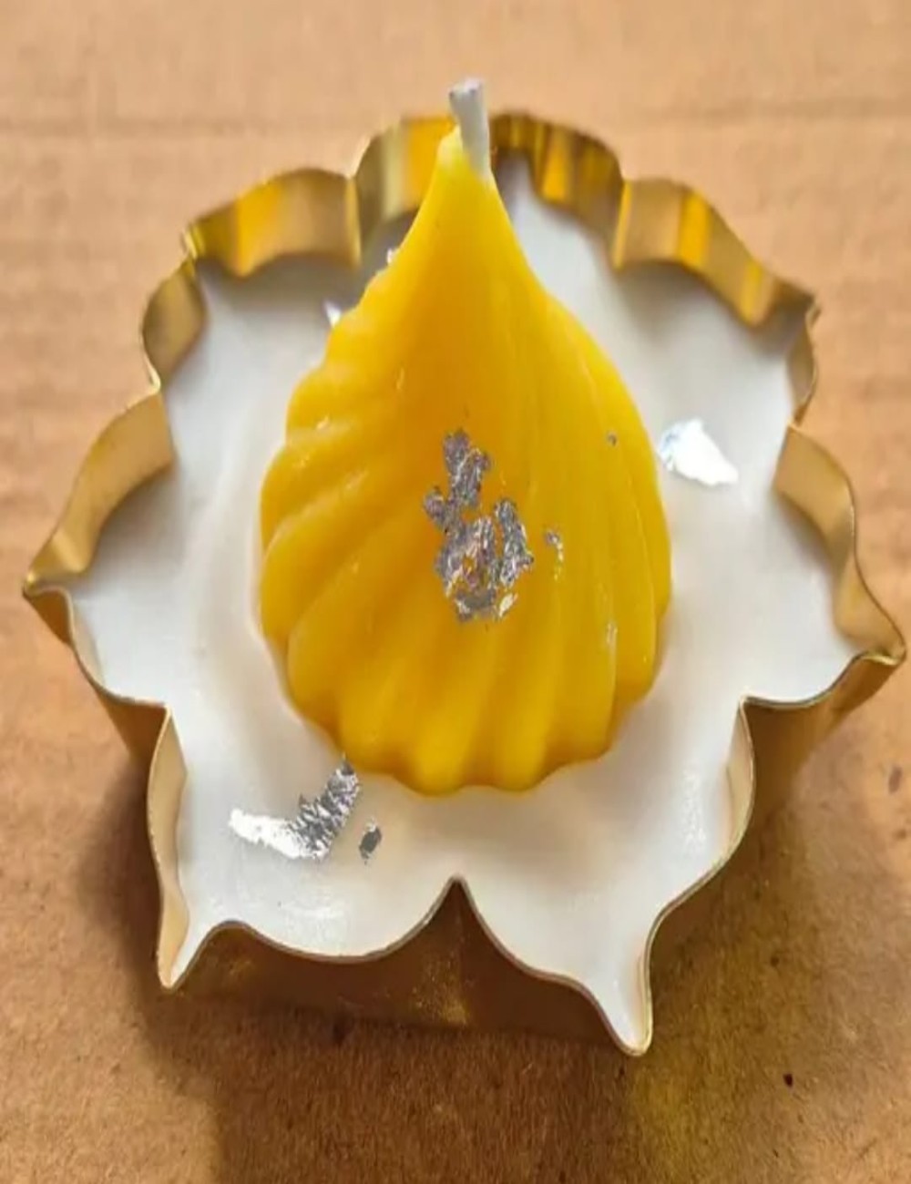 modak-shaped scented candle